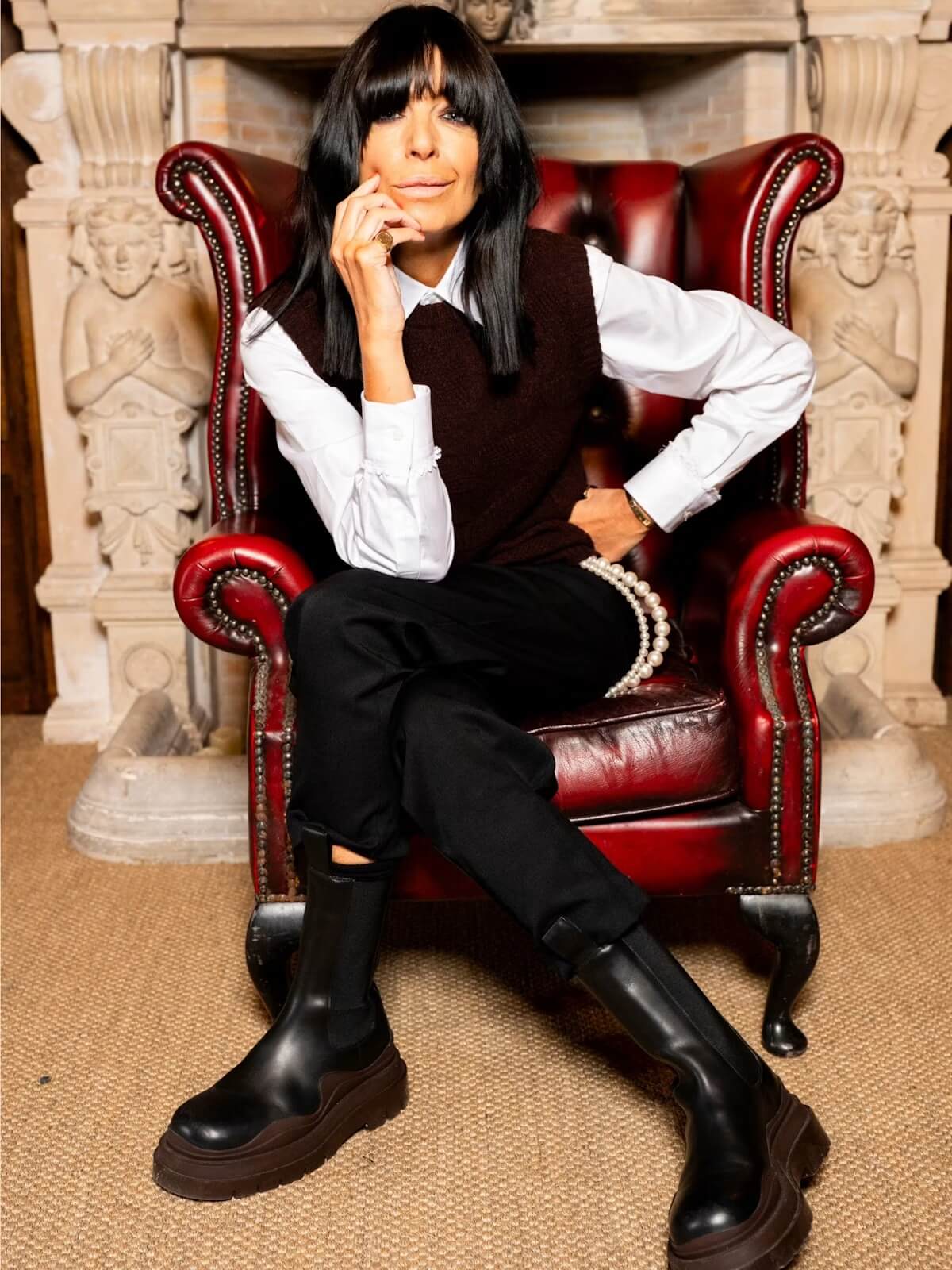 Claudia Winkleman’s Burgundy Vest on The Traitors: The Story of Soar