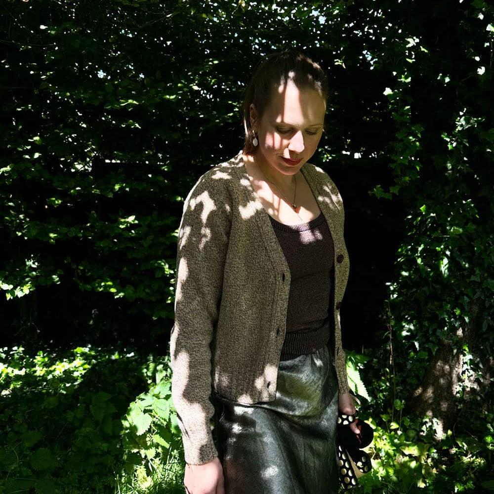 Alloa Lambswool Cardigan Lichen worn by Genevieve Sweeney