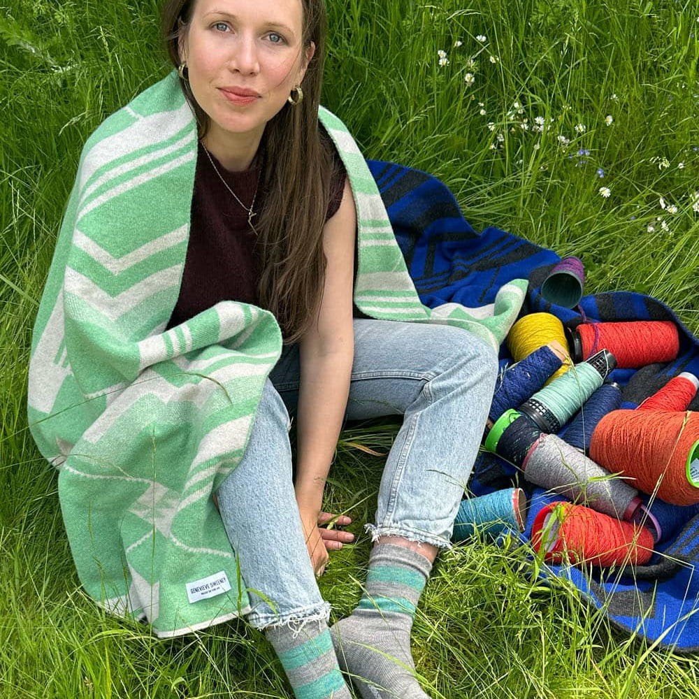 Genevieve Sweeney in the Geometric Lambswool Oversized Scarf Green