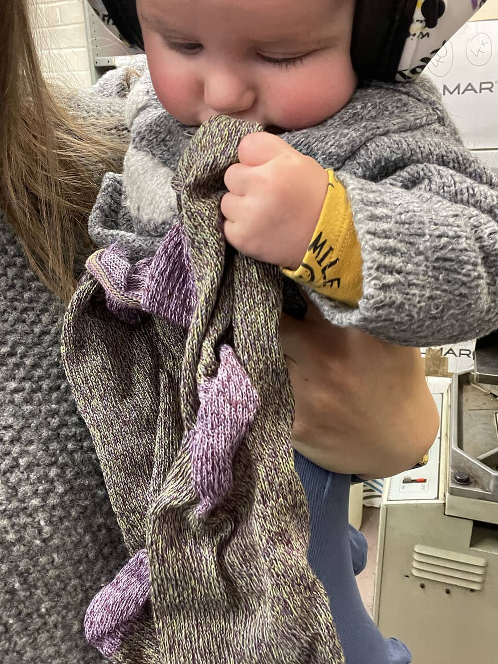 baby in the knitting factory