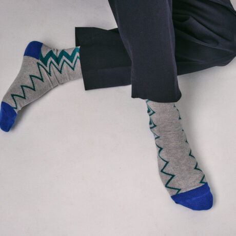 mens dark blue trousers styled with the Sigi Organic Cotton Zig Zag Socks in Grey and Blue